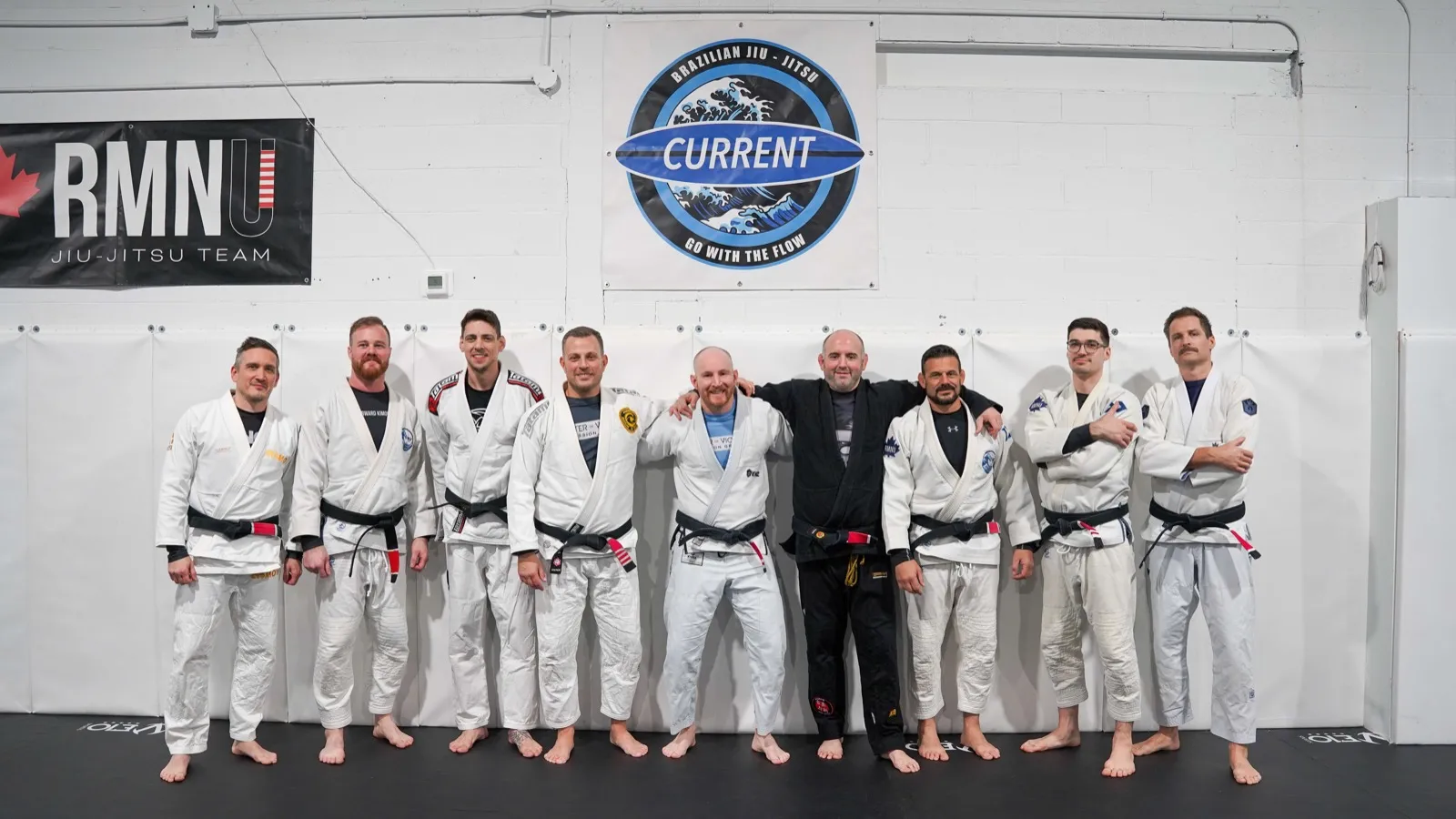 Black belt group at Current Jiu Jitsu